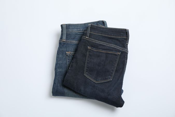 Jeans on light background, space for text