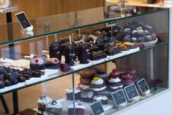 Various desserts on showcase in bakery