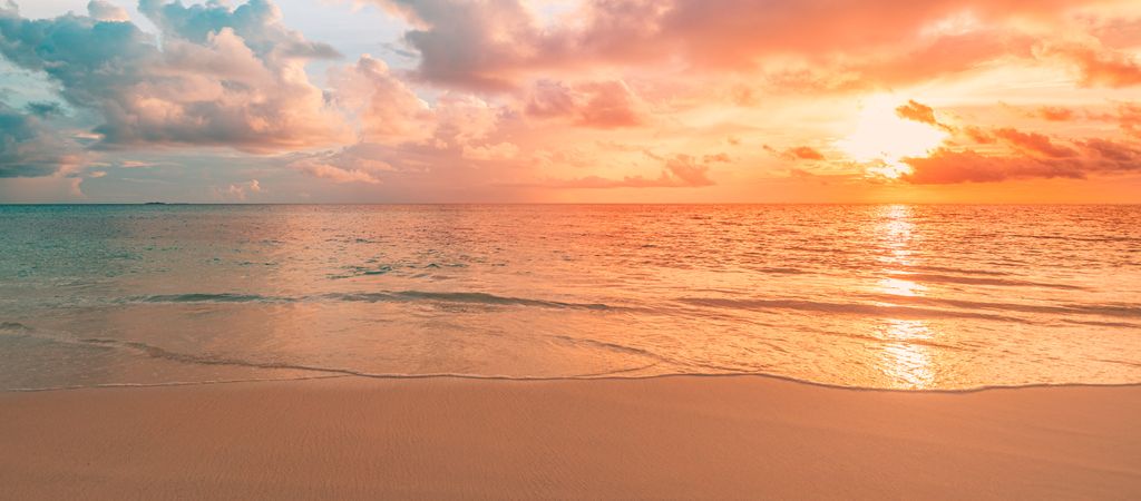 Wide shot of beautiful sunset in the Maldives