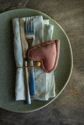 Table setting with pink felt heart