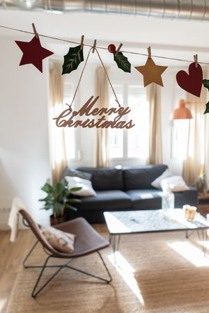 Light modern room decorated for Christmas