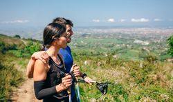 Couple stopping to look the views while doing trail
