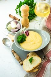 French onion cream soup served with wine