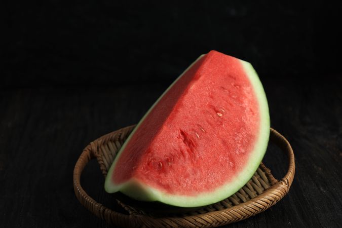 Fresh Red Watermelon on Rattan Plate