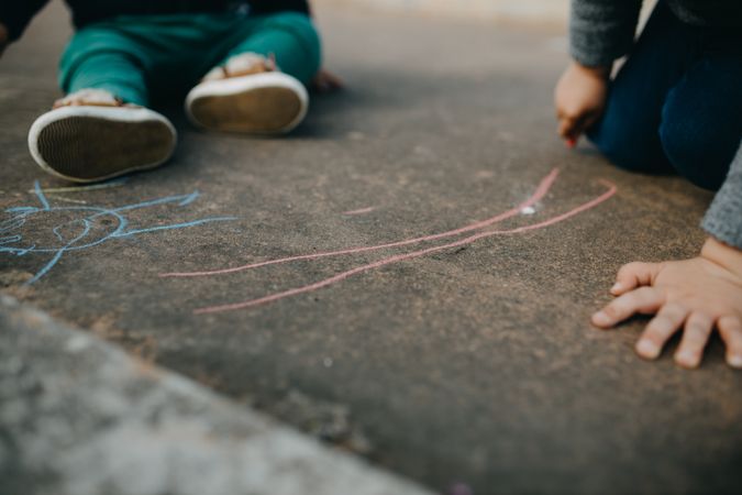 Children playing with chalk