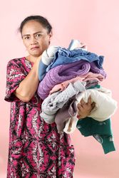 Asian Mom Holding Wrinkled Clothes Laundry with Angry Face Expression