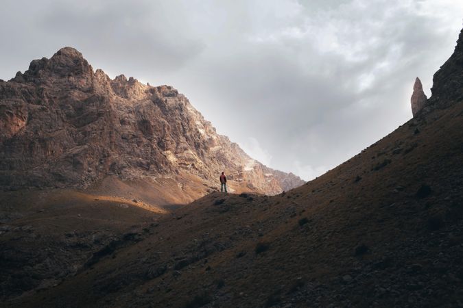 Person standing near mountains