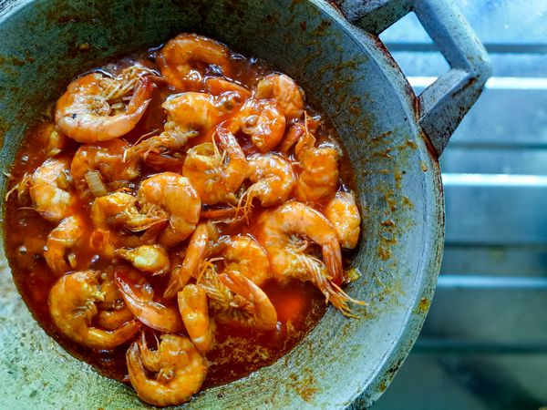 Top View of Spicy Padang-Style Shrimp Dish in Wok