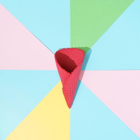 Abstract minimal background in pastel colors with red ice cream cone