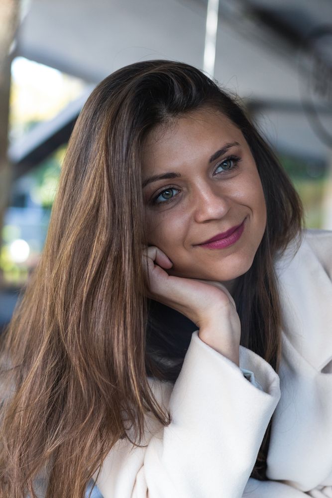 Portrait of smiling woman looking away