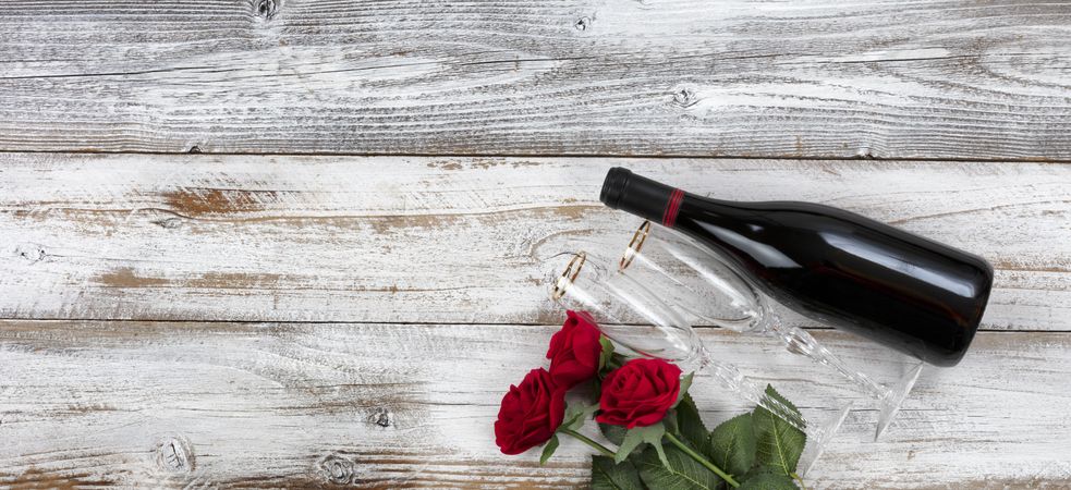 Valentine’s Day celebration with wine and flowers