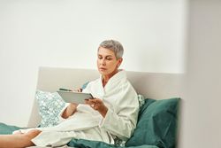 Mature woman relaxing at home