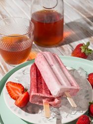 Refreshing strawberry popsicle on plate