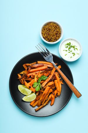 Concept of tasty food - sweet potato fries