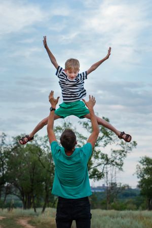 Affectionate father with son outdoor