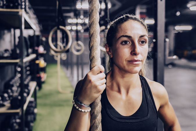 Fit female exercising in health club