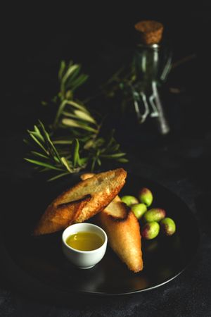 Fresh Spanish extra virgin olive oil with olives