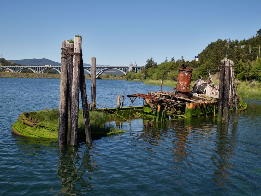 Remains of the Mary D. Hume coastal freighter decay in the harbor of Gold Beach, Oregon