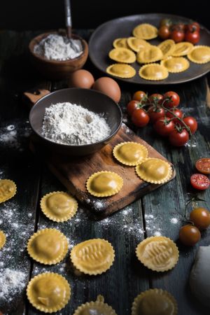 Homemade ravioli made with parmesan cheese, tomato and basil.