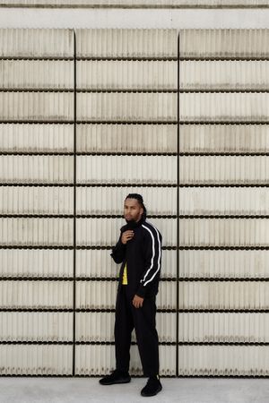 Black male near concrete blocks