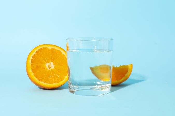 Glass of water with sliced orange