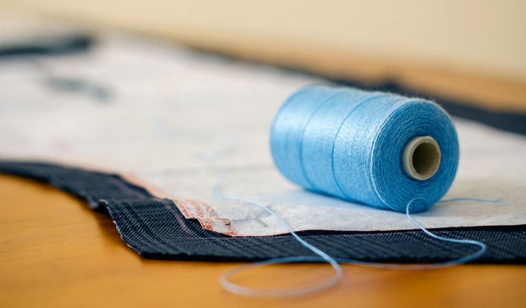 Spool of thread in a sewing workshop