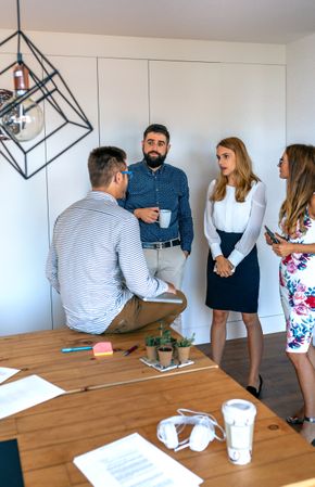 Businesspeople talking at work break in the office