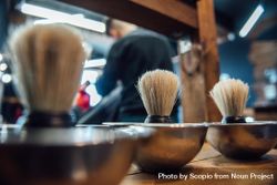 Shaving brushes in barber shop bG67a4