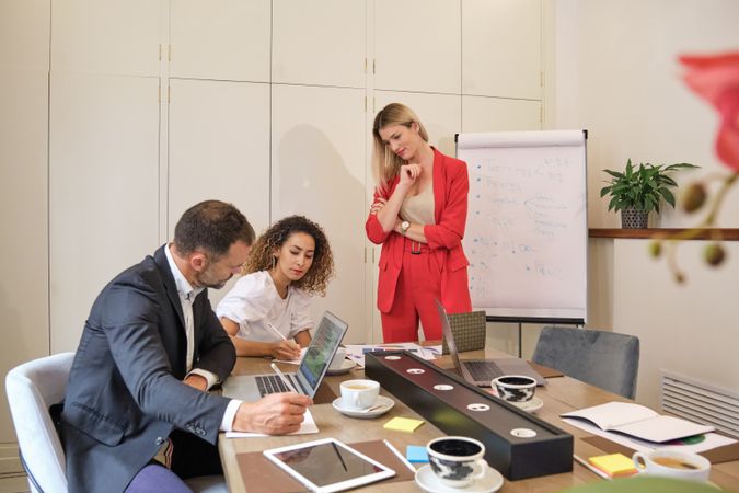 Business colleagues working on project in office