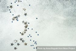 Festive Christmas card concept with silver star confetti decor 5oGNG5