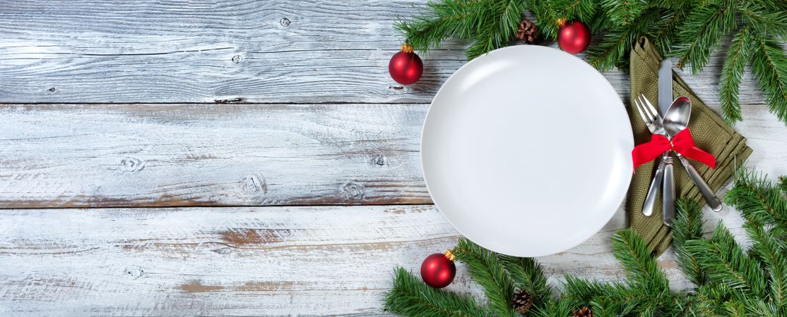 Christmas Table place setting on rustic wood