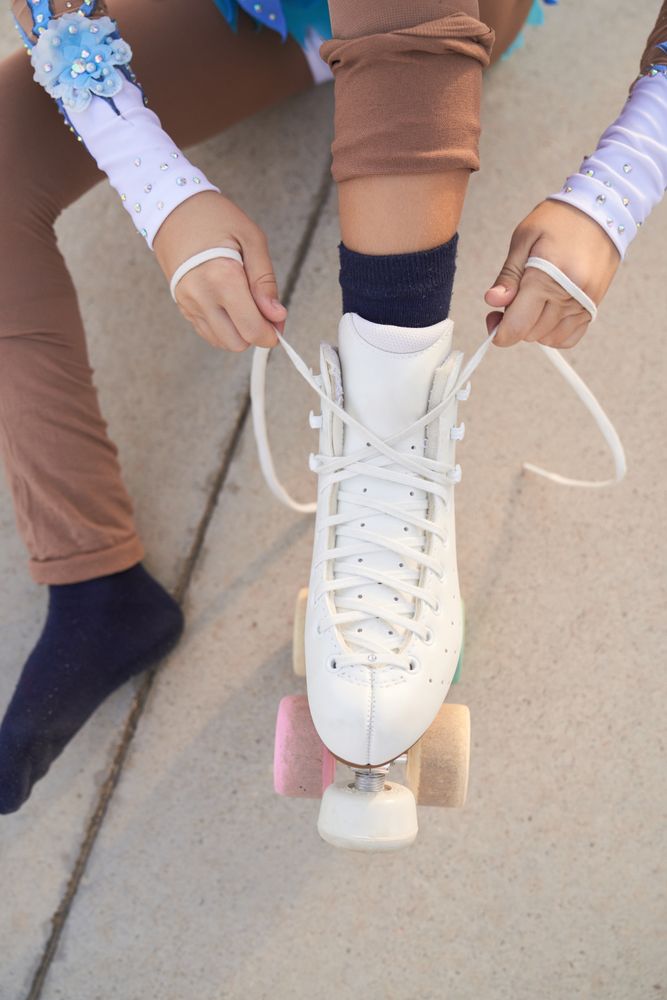 Anonymous person putting on roller skates