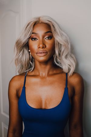 Charming Black woman in blue trendy dress