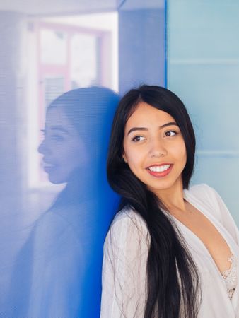 Young woman in beautiful dress smiling