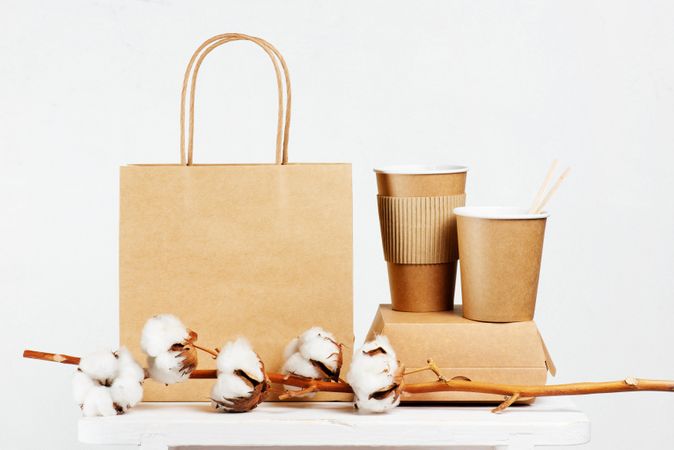 Brown recyclable shopping bags and to go containers with cotton