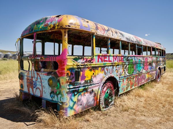 Spray painted old bus outside Washtucna, Washington