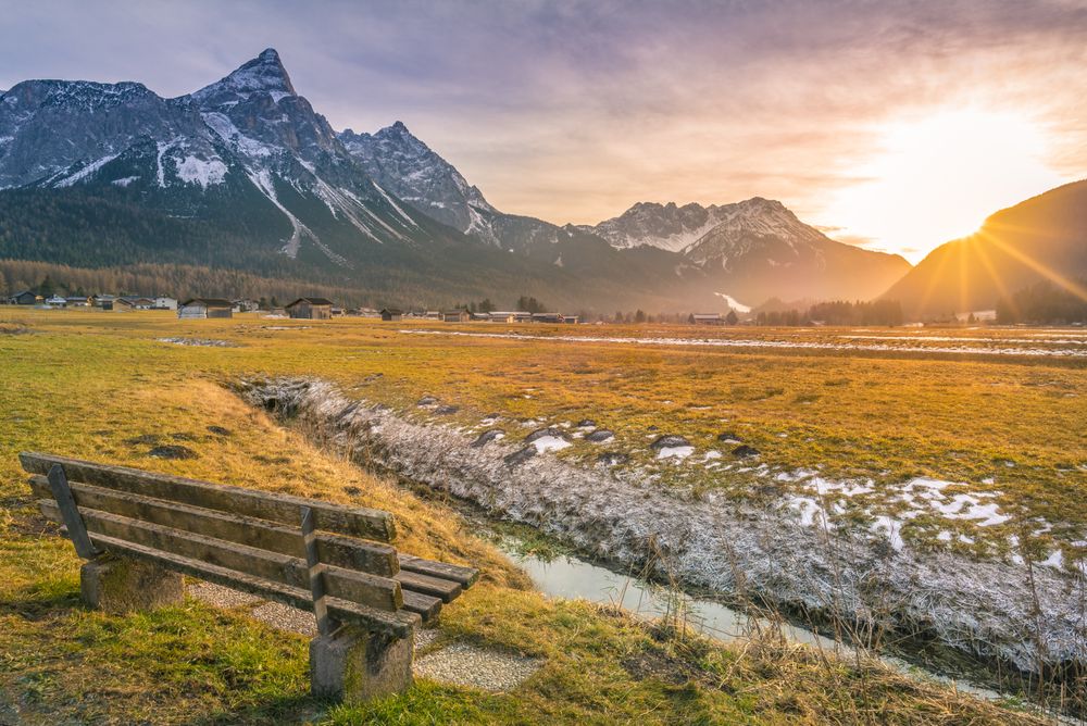 Wooden bench on mountain valley