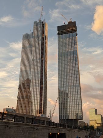 Two high-rise buildings in Moscow, Russia at sunset