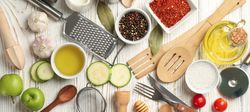 Composition with kitchen cutlery and ingredients for cooking on wooden background, top view