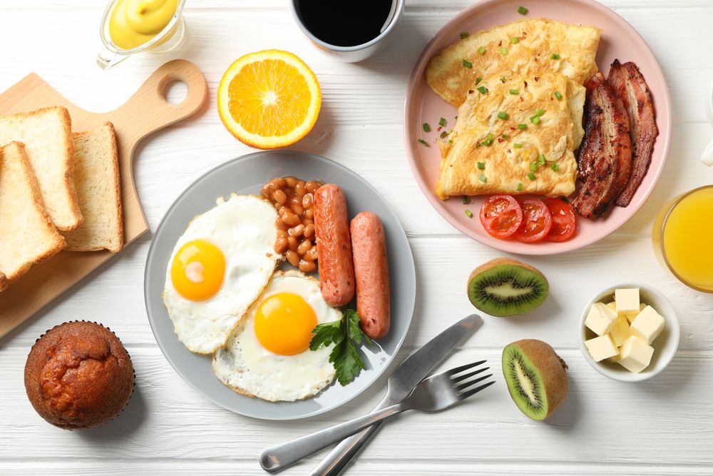 Top view of two plates of breakfast
