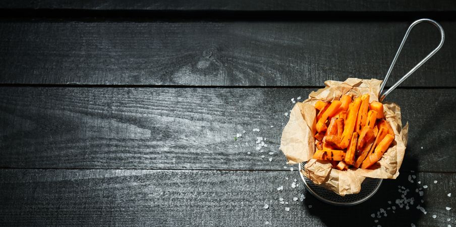 Concept of tasty food, fried sweet potato, space for text