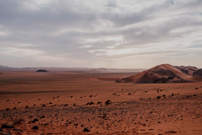 Sunset sky over hills in desert