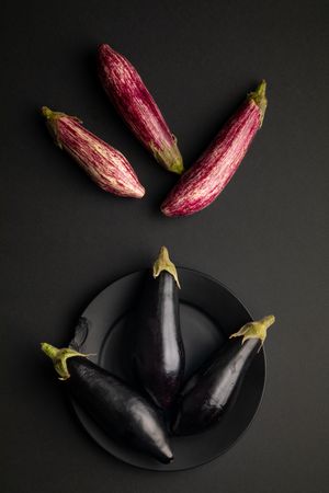 Ripe eggplants on tabletop