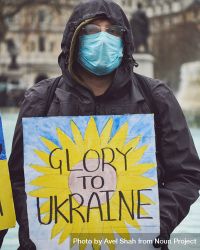 London, England, United Kingdom - March 5 2022: Man with “Glory to Ukraine” sign 5RAd10