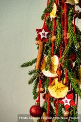 Close up of Christmas pine, baubles and dried fruit slices 41Vkjb
