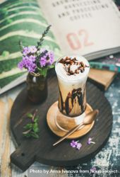 Latte in tall glass with chocolate syrup 5R2W15