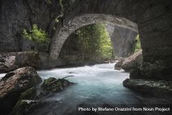 Bridge over the stream in the ravine of Pré Saint Didier, Aosta valley, Italy 5q63p4