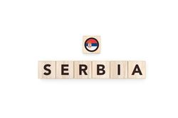 Wooden blocks bearing the name and flag of Serbia.