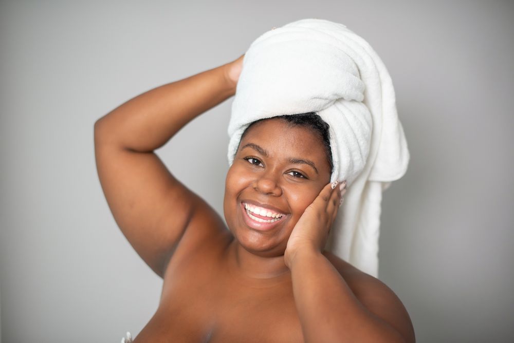 Cheerful plus size Black female model