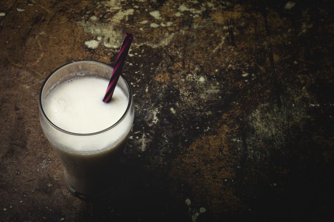 Glass of milk on table